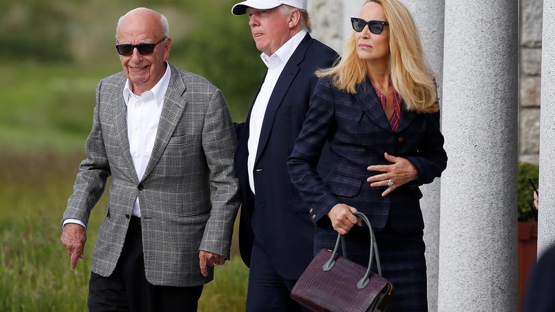 Rupert Murdoch with Donald Trump and his former wife Jerry Hall at Trump International Golf Links in Aberdeen, Scotland, 2016.
