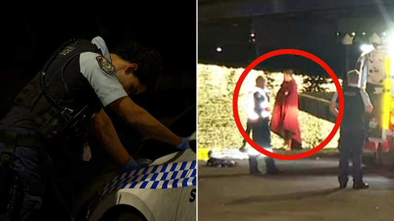 Police are pictured at the scene of the crash on Tuesday night.