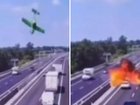 The horrifying moment a plane nose-dived onto a highway has been caught on camera.