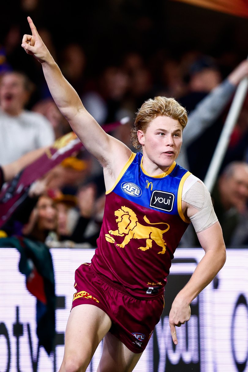 Levi Ashcroft Lions celebrates a goal against the Western Bulldogs.
