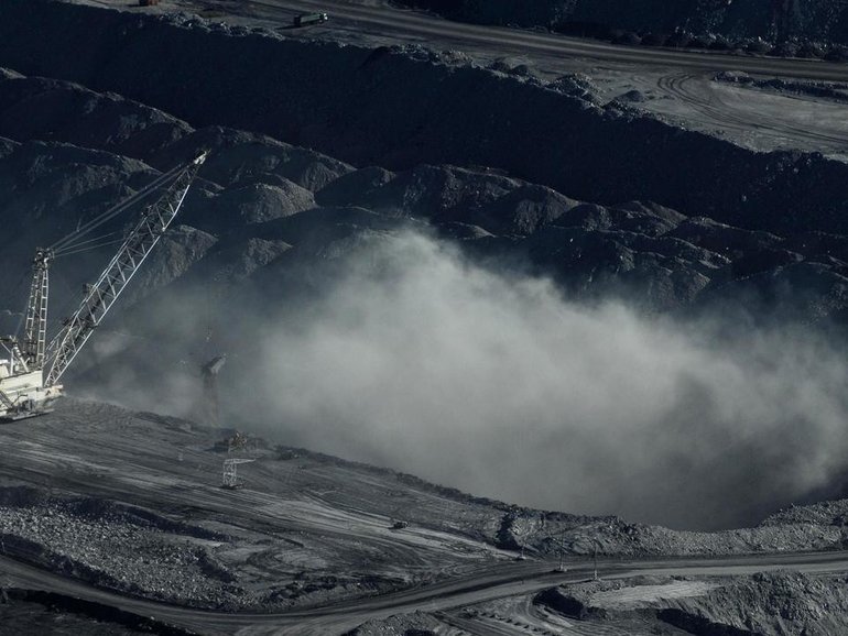 A community group has successfully challenged the 22-year expansion of an open-cut coal mine, arguing the local effects of climate change should be considered.