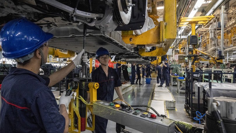 FILE — Workers on a production line at an electric-vehicle factory in Chongqing, China, May 20, 2025. European Union officials are set for a summit with China’s top leaders. China’s support of Russia and a long list of trade disputes are on the agenda.(Gilles Sabrié/The New York Times)