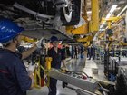 FILE — Workers on a production line at an electric-vehicle factory in Chongqing, China, May 20, 2025. European Union officials are set for a summit with China’s top leaders. China’s support of Russia and a long list of trade disputes are on the agenda.(Gilles Sabrié/The New York Times)
