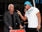 Hulk Hogan (R) and Ric Flair arrive at Sydney Airportin 2009.