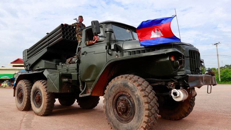 Cambodian soldiers ride on a self-propelled multiple rocket launcher in Oddar Meanchey province, Cambodia.