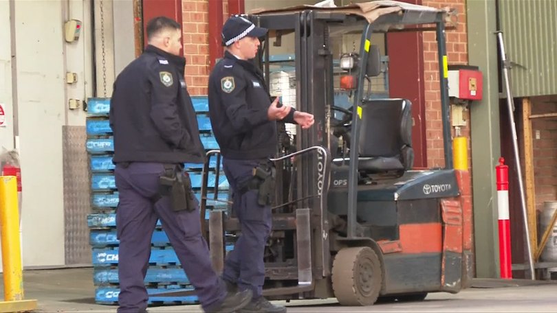 The man died after he became trapped under a forklift.
