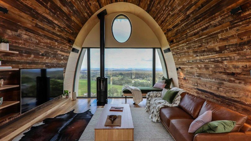 The barrel-shaped studio features a split-level design.