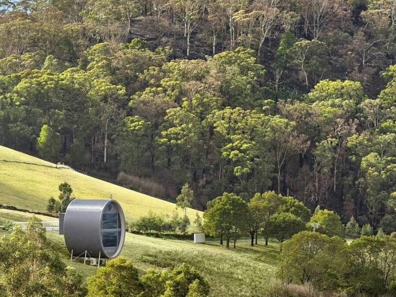 The curved villa was designed by local architect Robin Larsen.