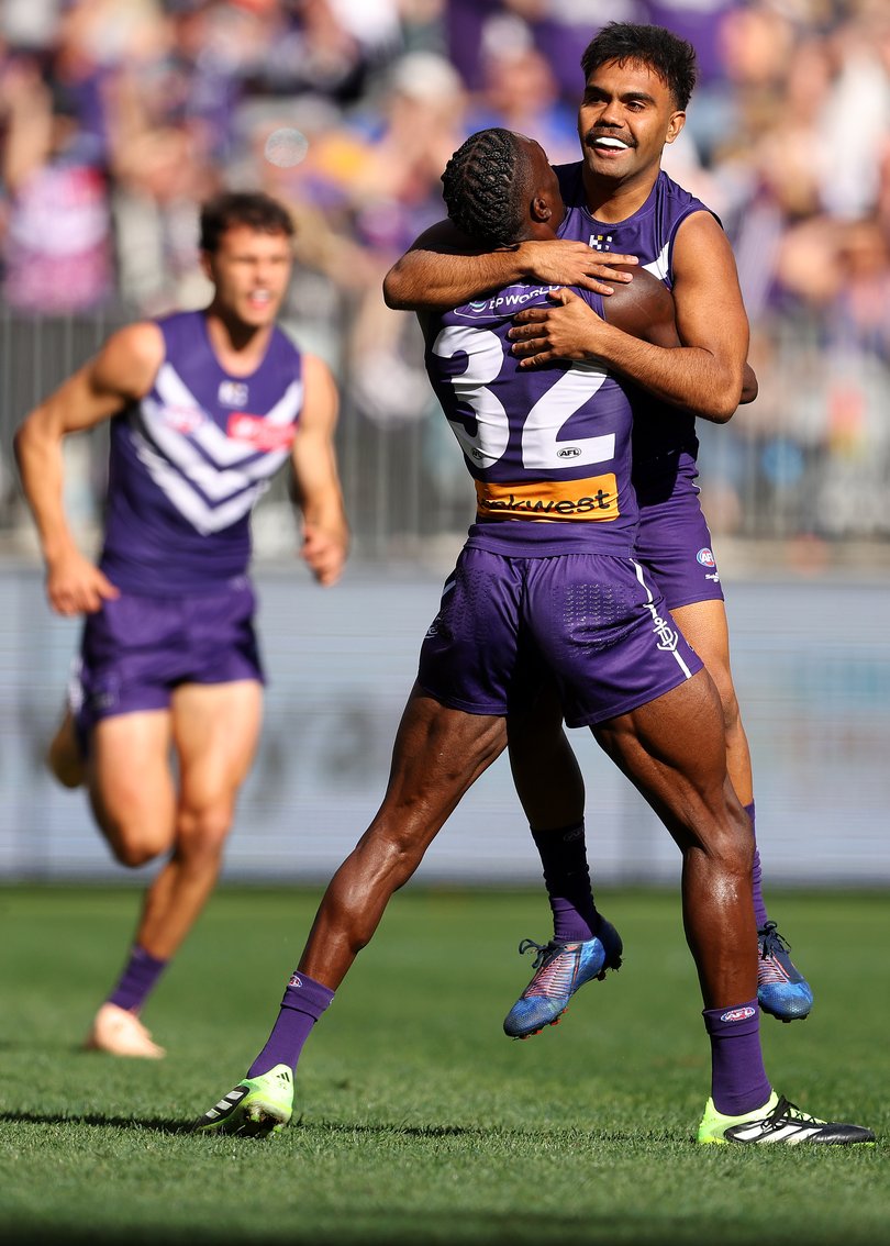 PERTH, AUSTRALIA - JULY 26: Isaiah Dudley of the Dockers celebrates a goal during the round 20 AFL match between the Fremantle Dockers and West Coast Eagles at Optus Stadium on July 26, 2025 in Perth, Australia. (Photo by Paul Kane/Getty Images via AFL Photos)