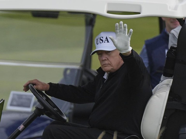 Donald Trump put down his golf clubs to intervene in the Thai-Cambodia border dispute. (AP PHOTO)