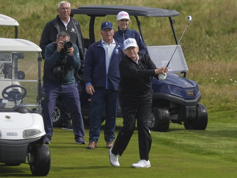 Scottish protests against President Donald Trump's visit took place in Edinburgh and Aberdeen. (AP PHOTO)