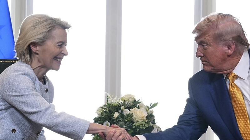 Donald Trump and Ursula von der Leyen shake hands after reaching a US-EU trade deal framework (AP PHOTO)