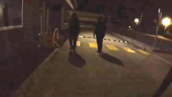 Two of the vandals are seen clad in back just before they launch an attack.