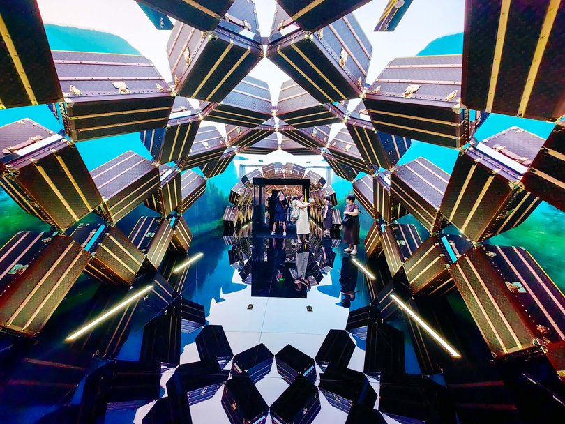 People visit the The Louis, Louis Vuitton's new multi-sensory flagship store shaped like a ship, on July 2, 2025 in Shanghai, China.