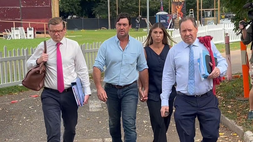 Matt Wright, second left, arrives at the Supreme Court in Darwin.