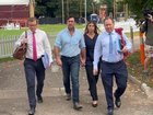  Matt Wright, second left, arrives at the Supreme Court in Darwin.