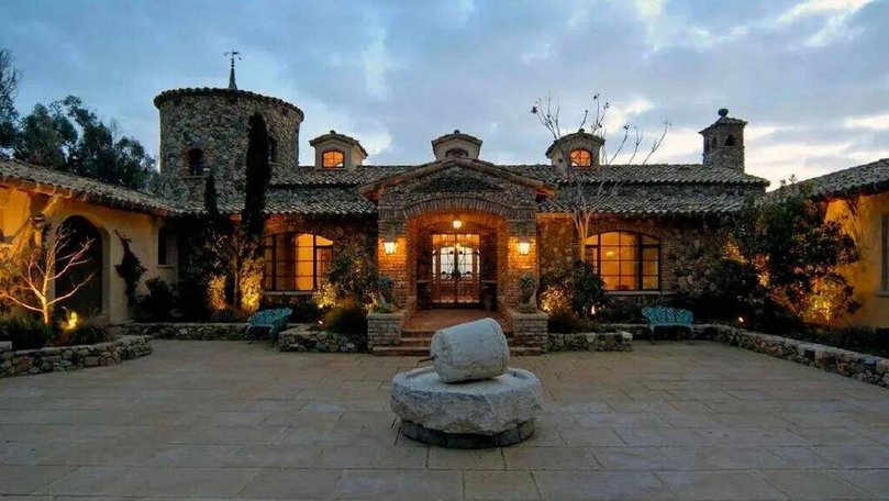 Portia de Rossi and Ellen DeGeneres sold this Tuscan-style mansion in California for US$96 million in 2024. Picture Sotheby's International Realty