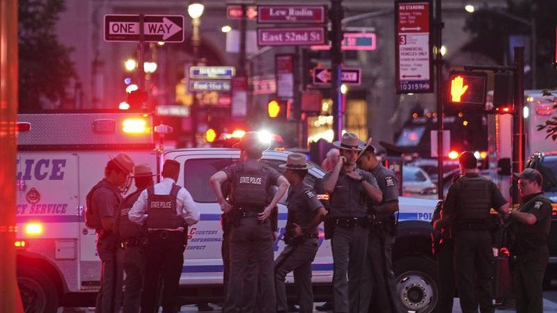 A lone gunman who attacked an office building in Manhattan is dead, New York Police say. (AP PHOTO)