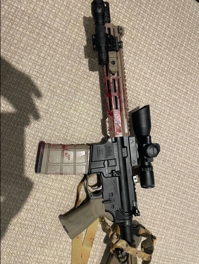 The gun used in the massacre was seen smeared with blood.