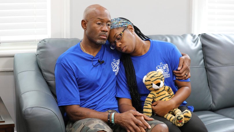 Clarence and Ebony Carr hug as they talk about the death of their son from a brain-eating amoeba he got at a popular South Carolina lake.