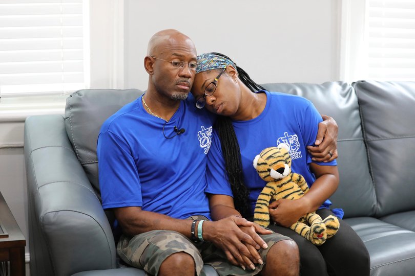 Clarence and Ebony Carr hug as they talk about the death of their son from a brain-eating amoeba he got at a popular South Carolina.