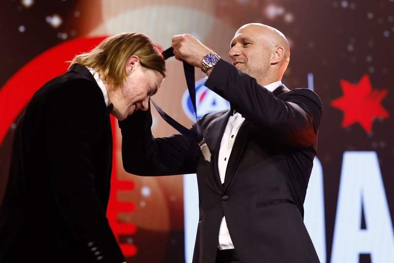 Harley Reid is presented the NAB AFL Goal of the Year by Chris Judd in 2024.