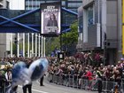 Fans gathered along Broad Street in Birmingham for the funeral procession for Ozzy Osbourne. 