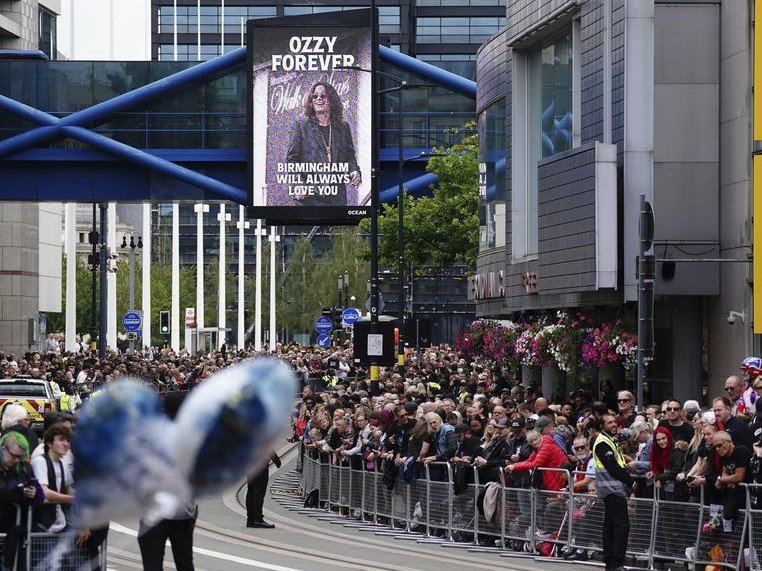 Fans gathered along Broad Street in Birmingham for the funeral procession for Ozzy Osbourne. 
