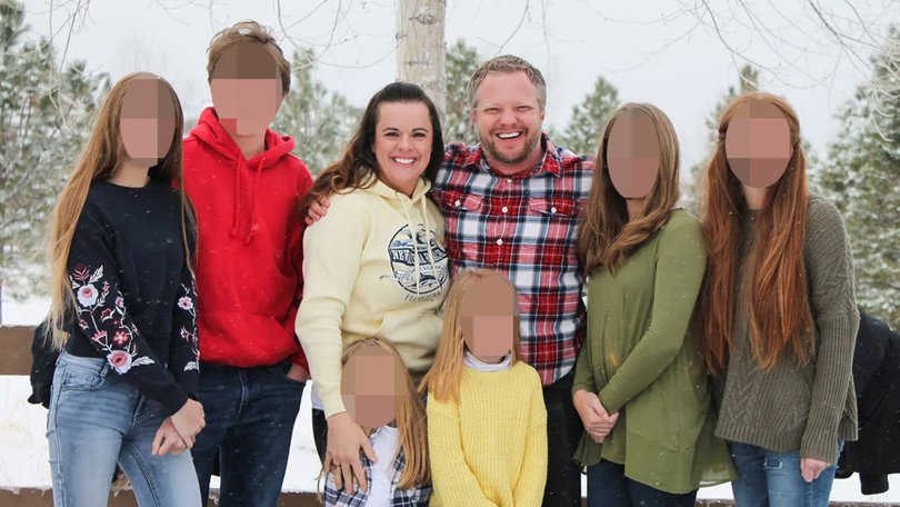 Angela and James Craig in a family portrait.