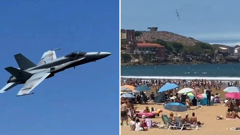 An F-18 fighter jet nearly crashed into a beach full of tourists and locals.