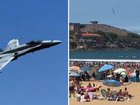 An F-18 fighter jet nearly crashed into a beach full of tourists and locals.