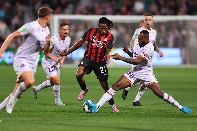 PERTH, AUSTRALIA - JULY 31: Brian Kaltak of the Glory is challenges Samuel Chukwueze of AC Milan during the match between Perth Glory and AC Milan at HBF Park on July 31, 2025 in Perth, Australia. (Photo by Paul Kane/Getty Images)