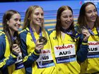 Mollie O'Callaghan and her teammates show off their 4x200m freestyle relay gold medals. (EPA PHOTO)