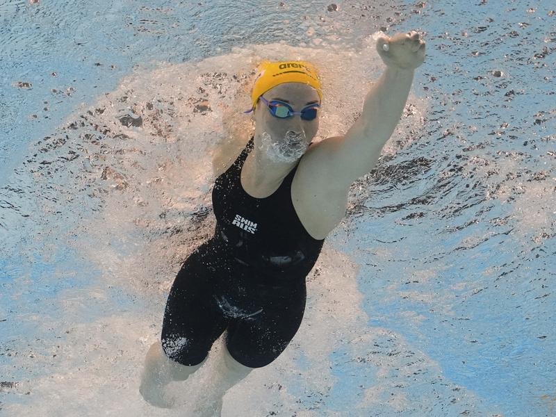 Mollie O'Callaghan races in Singapore, where she has equalled the feats of an Australian legend. 