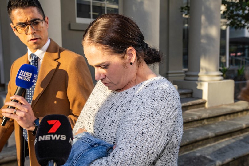 Burton denied it was due to the child having a different father.