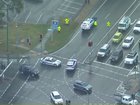 A 10-year-old child has been hit by a police car that was travelling under lights and sirens.
