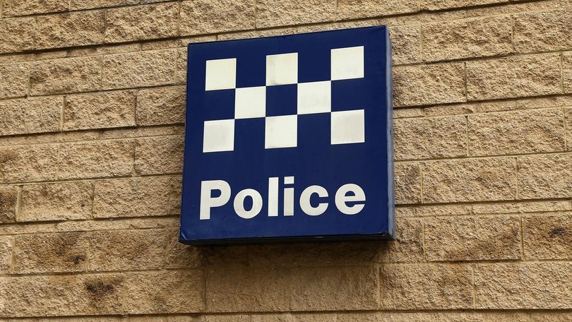 Police allege a man "inadvertently" displayed inappropriate images during a university lecture.
