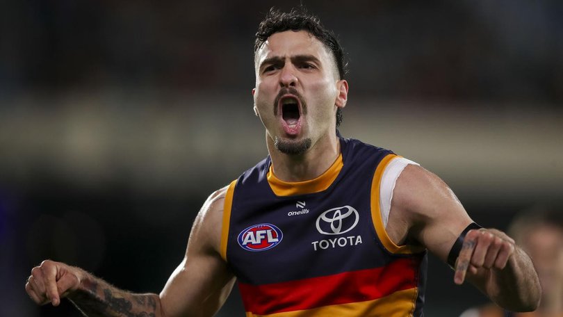 Izak Rankine has helped the Crows overcome Hawthorn in Adelaide to go top of the ladder.