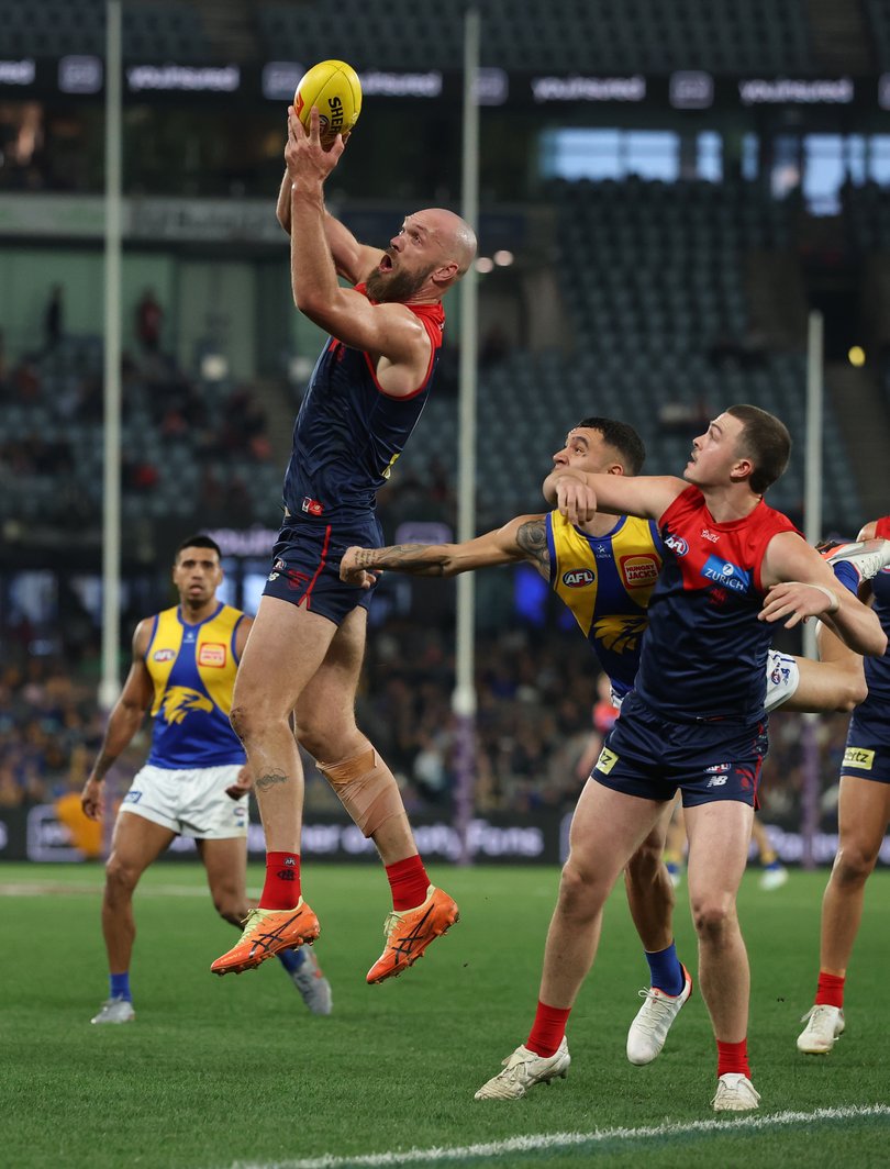 MELBOURNE, AUSTRALIA - AUGUST 02: Max Gawn of the Demons marks during the round 21 AFL match between Melbourne Demons and West Coast Eagles at Marvel Stadium on August 02, 2025 in Melbourne, Australia. (Photo by Robert Cianflone/Getty Images)