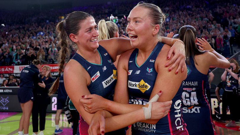Melbourne Vixens stars Kate Eddy and Hannah Mundy celebrate the win.