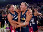 Melbourne Vixens stars Kate Eddy and Hannah Mundy celebrate the win.