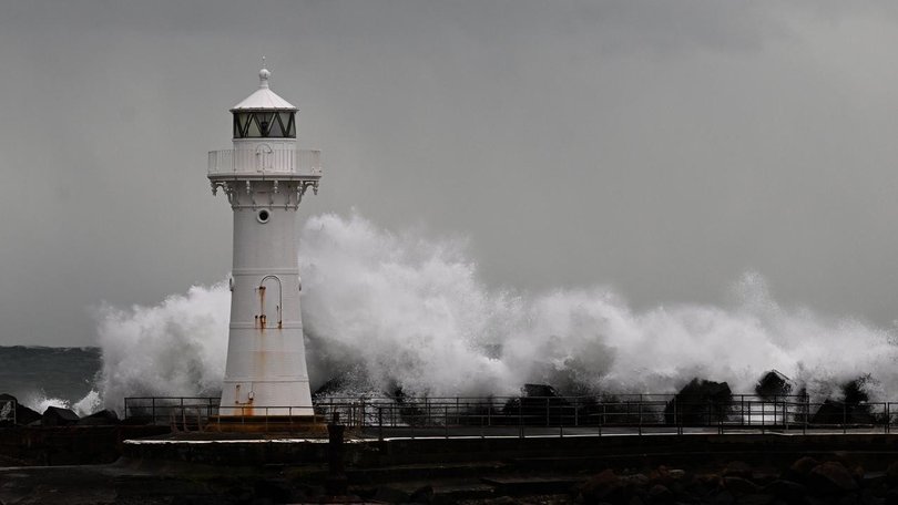 Large swells are expected to continue to batter the NSW coastline on Sunday. (Dean Lewins/AAP PHOTOS)