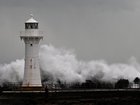 Large swells are expected to continue to batter the NSW coastline on Sunday. (Dean Lewins/AAP PHOTOS)