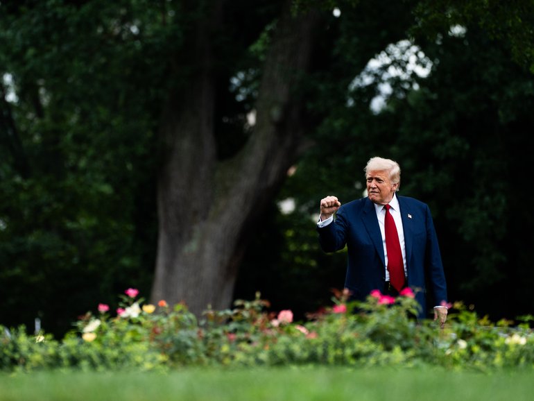 President Donald Trump makes his way to Marine One at the White House on Friday. 
