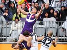 Sport. AFL. Fremantle Dockers v Carlton Blues at Optus Stadium. Docker Patrick Voss flies for a mark on the shoulders of an opponent.