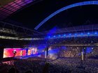 Liam Gallagher sings the final song of Saturday's Oasis gig, moments before a fan fell to his death. (Katelyn Catanzariti)