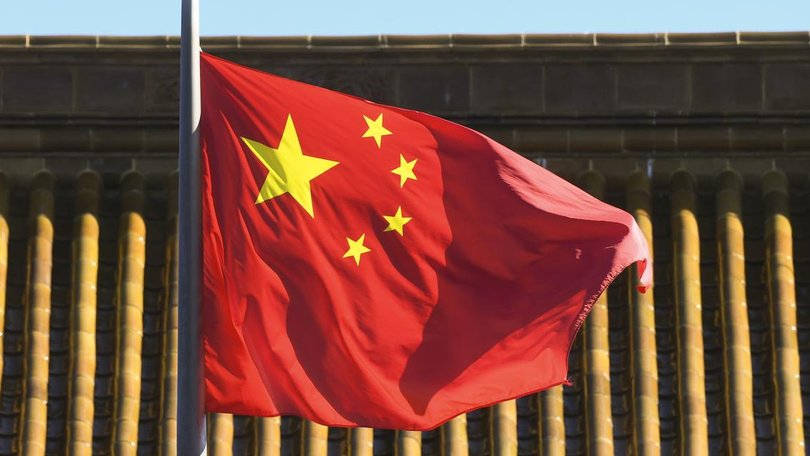 The AFP has charged a Chinese national with foreign interference. 