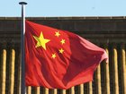The AFP has charged a Chinese national with foreign interference. 
