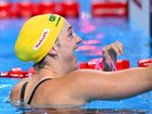 Meg Harris celebrates her 50m freestyle gold medal.