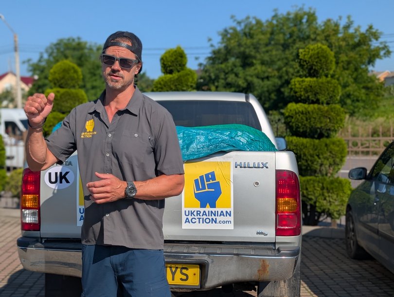 Ukrainian Action Founder and CEO Jeffrey Hartman with an aid truck in Lviv, Western Ukraine.